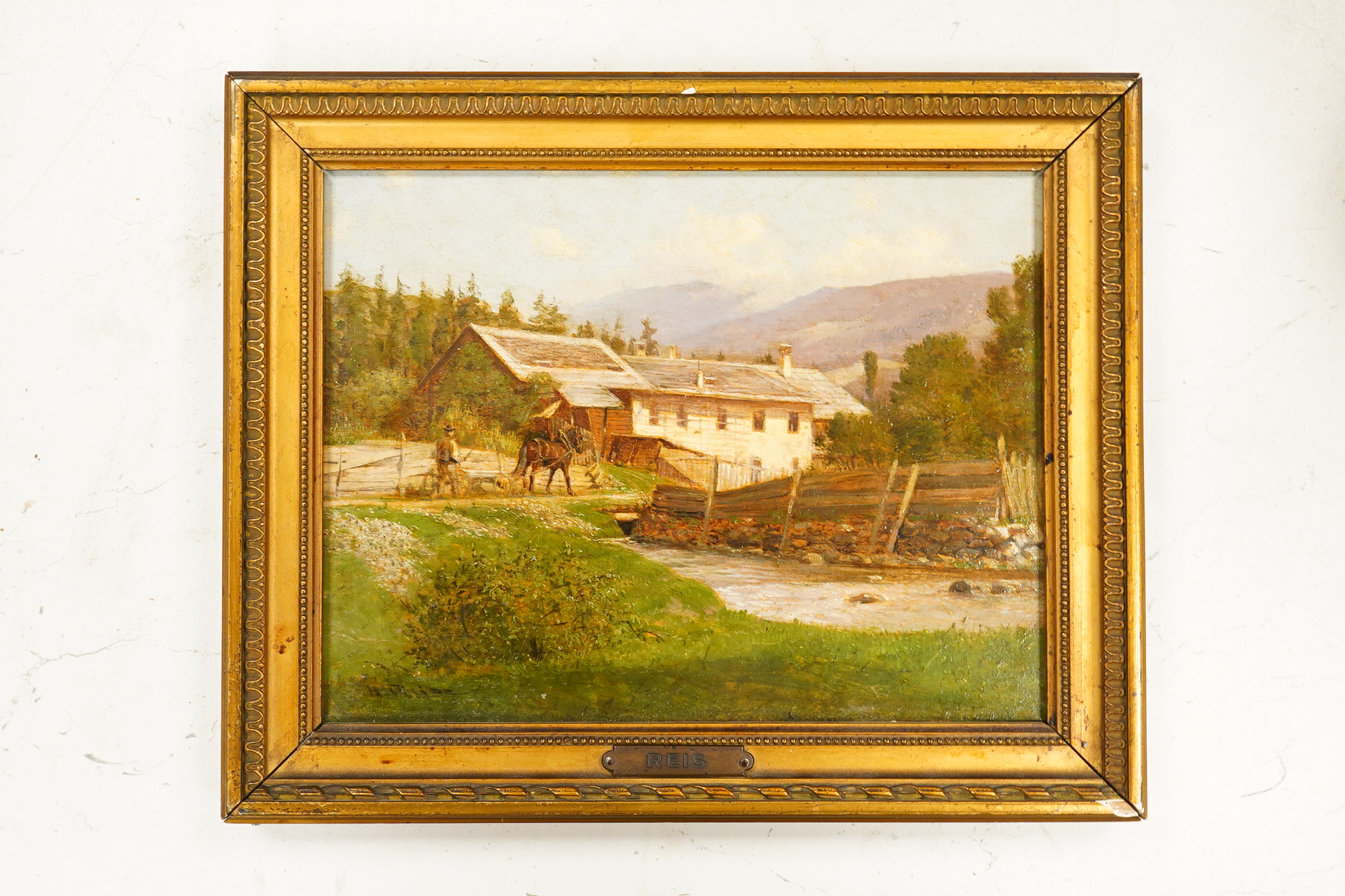 Attributed to Hermann Reisz (1865-1920), oil on panel, Continental farmstead, signed, applied plaque to the frame, 16 x 22cm. Condition - good